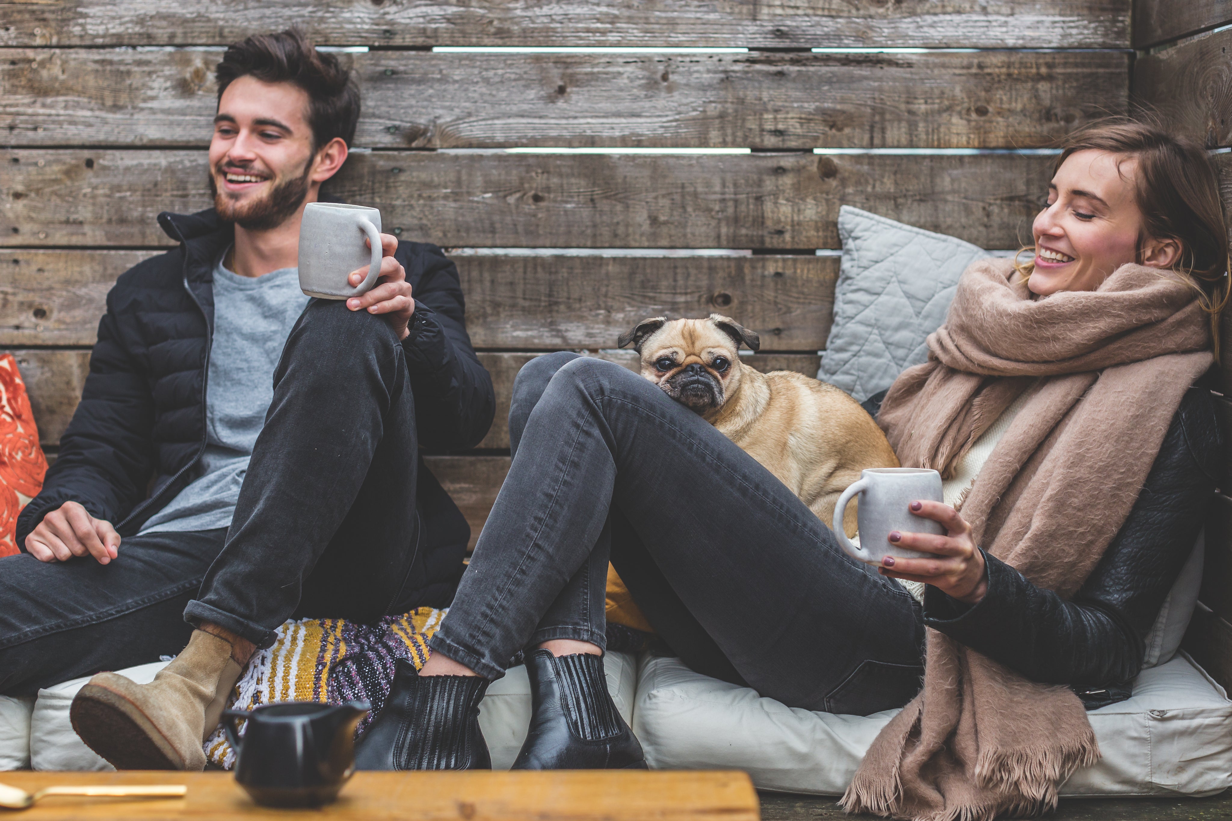 files/smiling-man-woman-pug.jpg